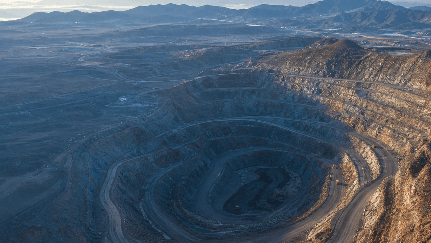 Large open-pit mine in clear morning light